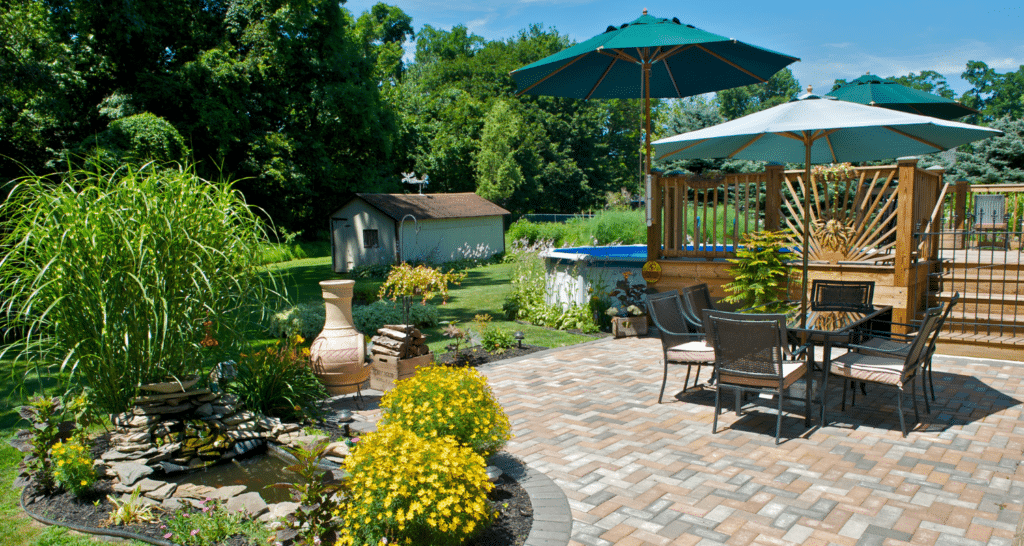 patio design. The lower level is stone and the upper level is wood.