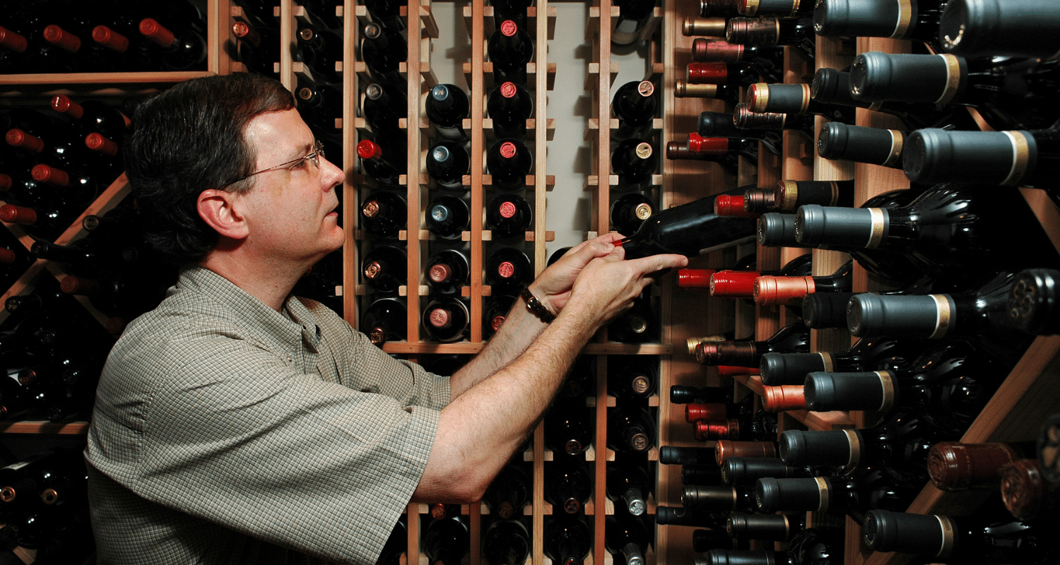 man in wine cellar